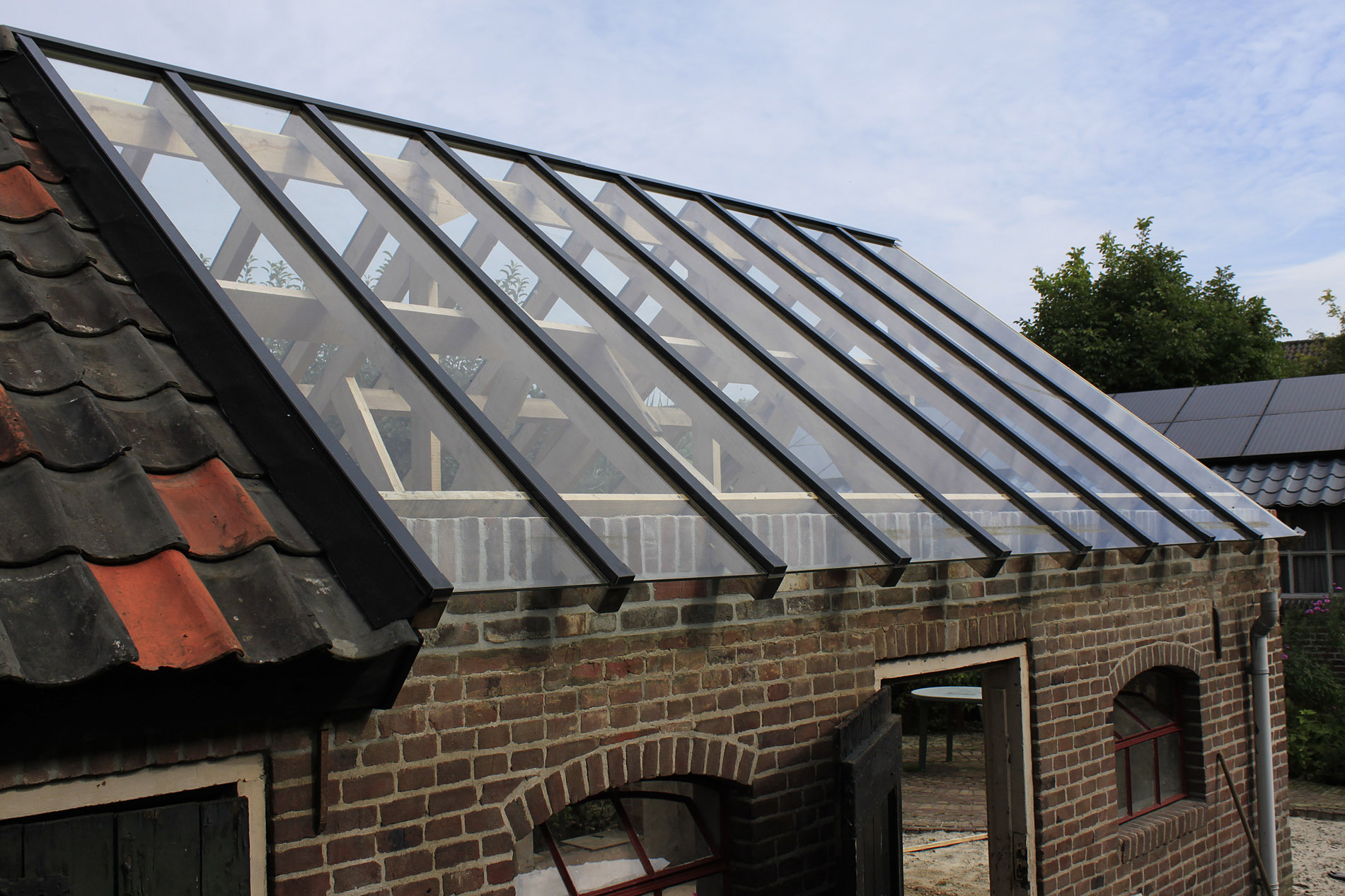Glasbedrijf Smits - Glazen dak op boerderij Lieshout